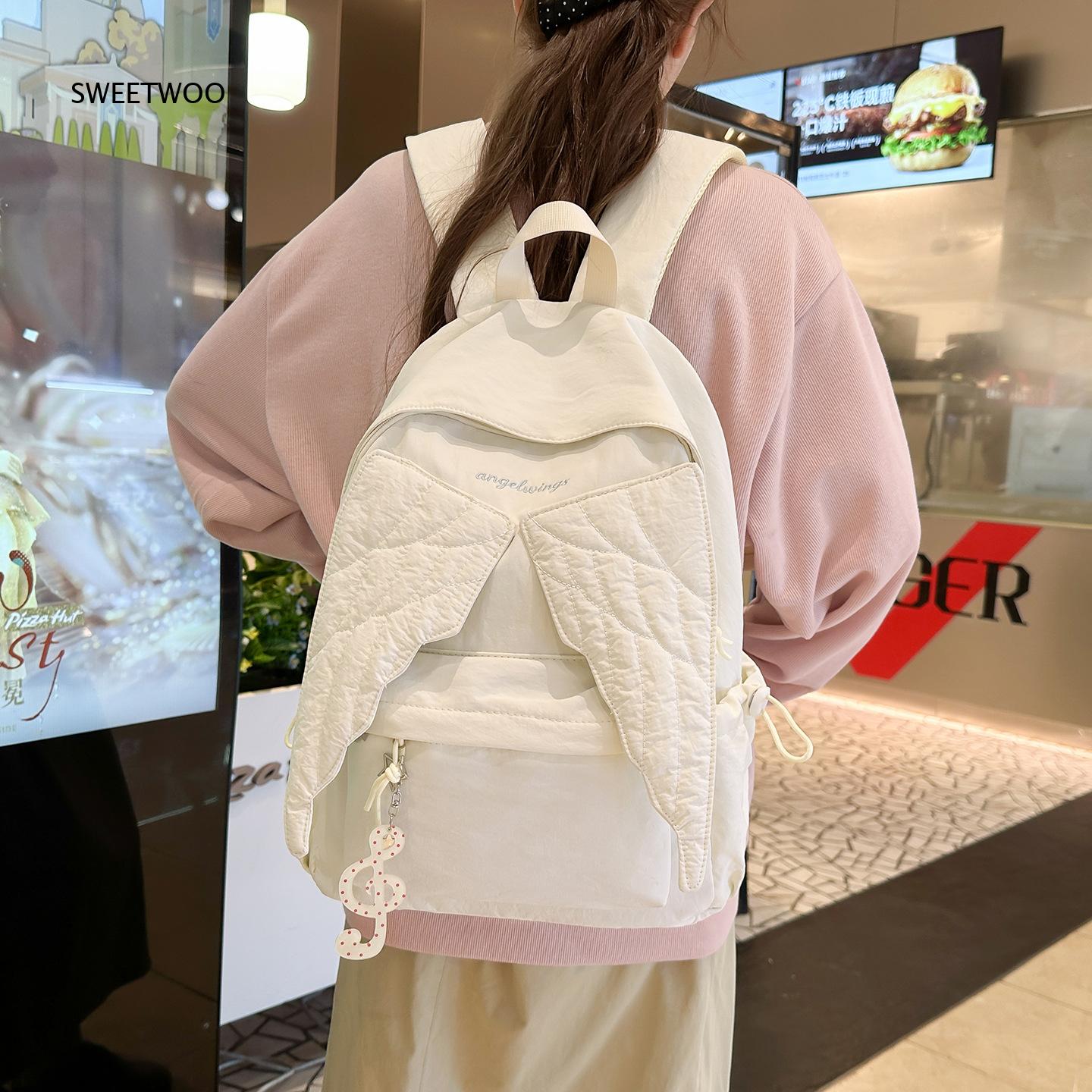 Mochila Feminina Rosa com Asas - Embroidery Quilting avaliação e preço